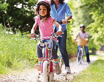 Family bicking on a trail